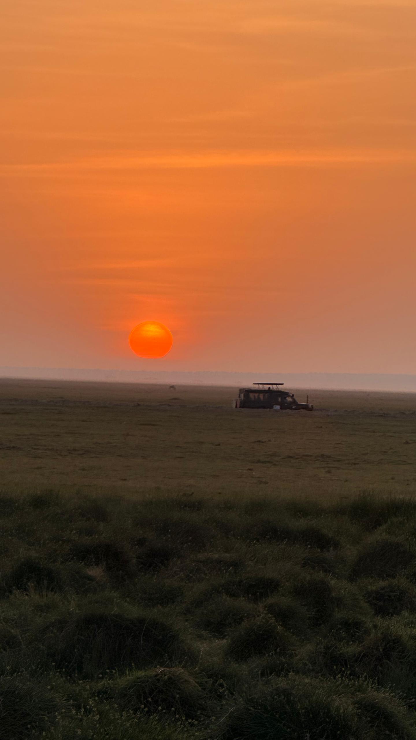 Maasai Mara sunrise · captured by Madam Teoh on safari
